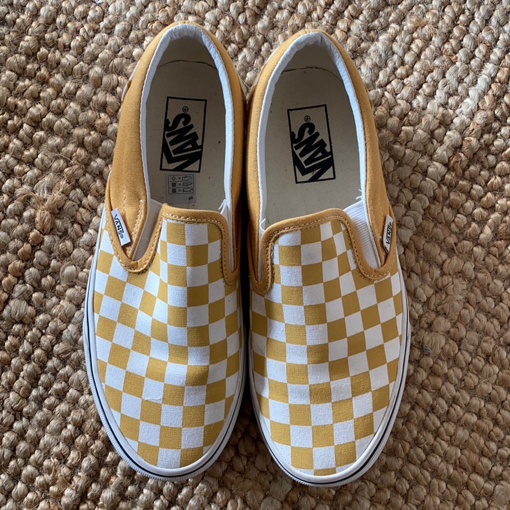 Brand new checkered Vans slip-ons